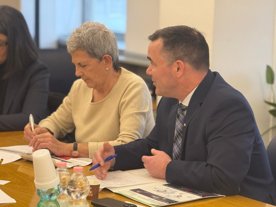 Fisheries and Aquaculture Minister Kent Smith sitting at a table