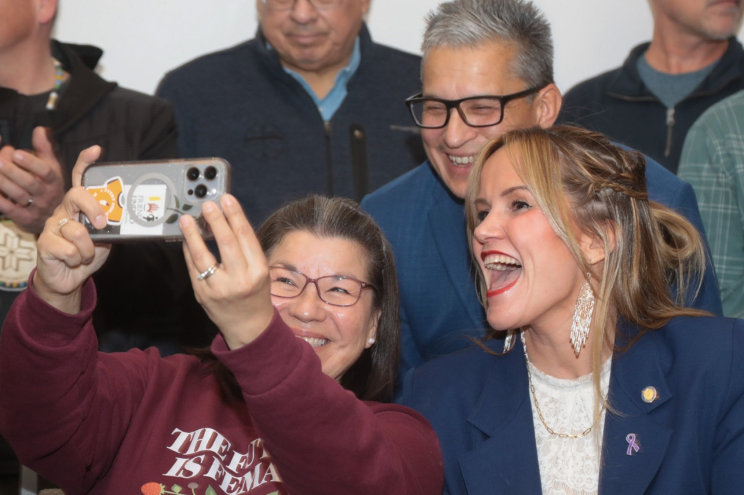 Assembly of First Nations Regional Chief for Nova Scotia Andrea Paul; Potlotek Chief Wilburt Marshall; and Leah Martin, Minister responsible for L'Nu Affairs, take a selfie at the event. 