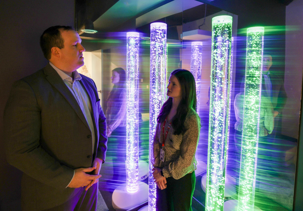 Addictions and Mental Health Minister Brian Comer and Chloe Curtis, youth peer support worker in a sensory room