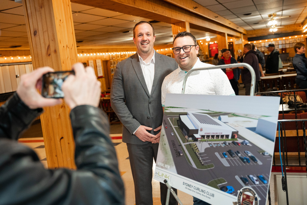 Addictions and Mental Health Minister Brian Comer and new Sydney Curling Club president Travis Stone