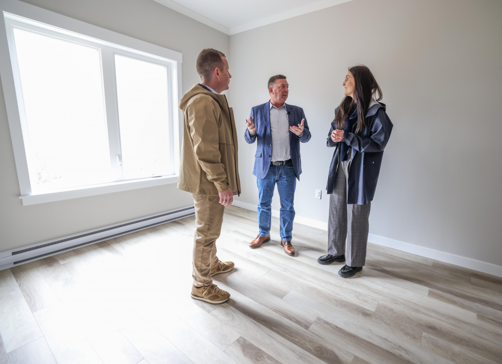 Bruce Wood (centre), Director, Building Infrastructure and Asset Management, Nova Scotia Provincial Housing Agency, Colton LeBlanc, Minister of Growth and Development, and Jill Balser, Minister of Service Nova Scotia and MLA for Digby Annapolis.
