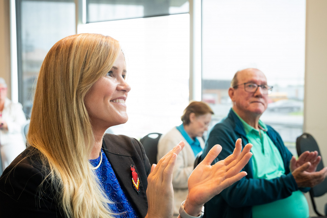 Leah Martin, Minister of L'Nu Affairs, and Membertou Chief Terry Paul applauding