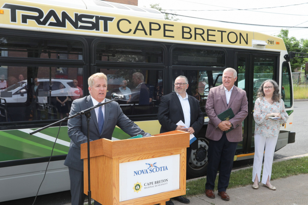 Scott Armstrong, Minister of Opportunities and Social Development, speaks during the announcement whiL-R: Scott Armstrong, Fred Tilley, Cecil Clarke and Dorothy Halliday.