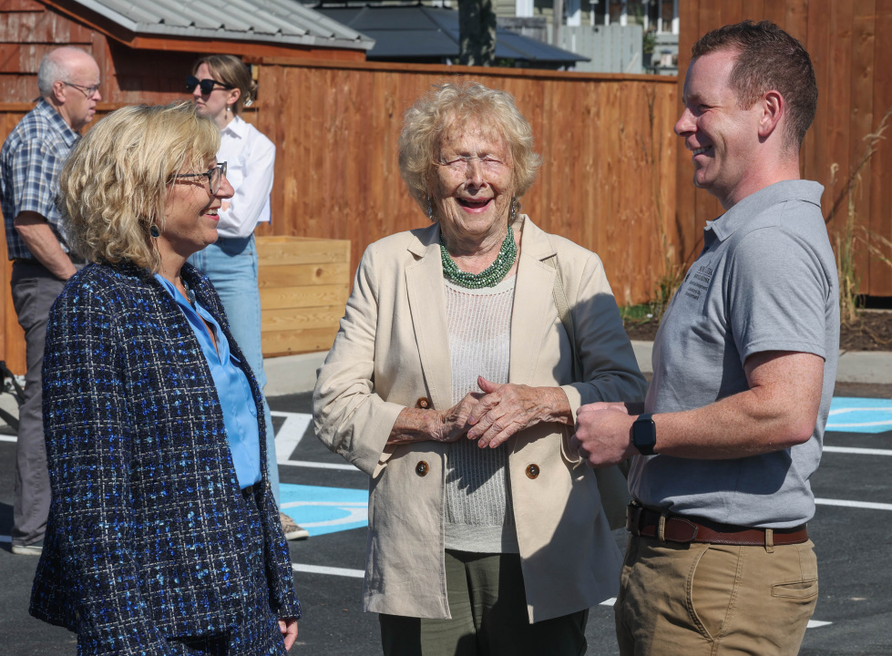 Seniors and Long-Term Care Minister Barbara Adams (left), well-known Dartmouth advocate Gloria McCluskey and Growth and Development Minister Colton LeBlanc share a laugh before an affordable housing announcement.