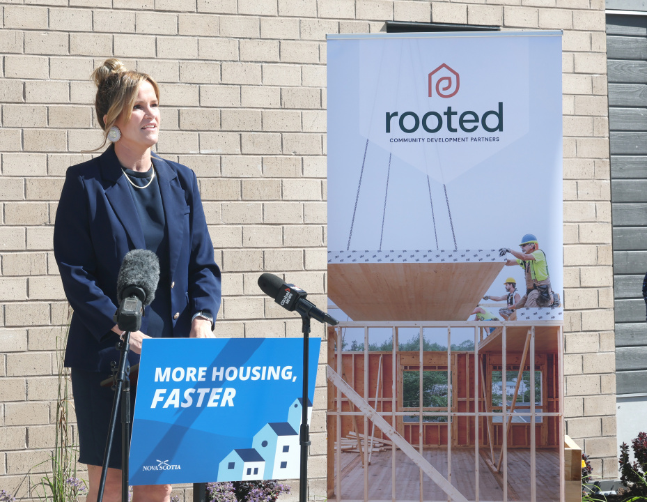 L'nu Affairs Minister Leah Martin standing at a podium