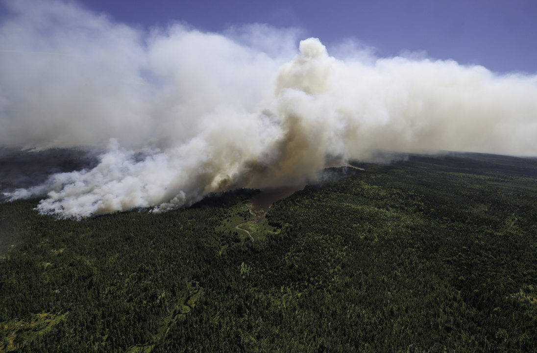 Smoke from the Long Lake wildfires complex billows into the air.