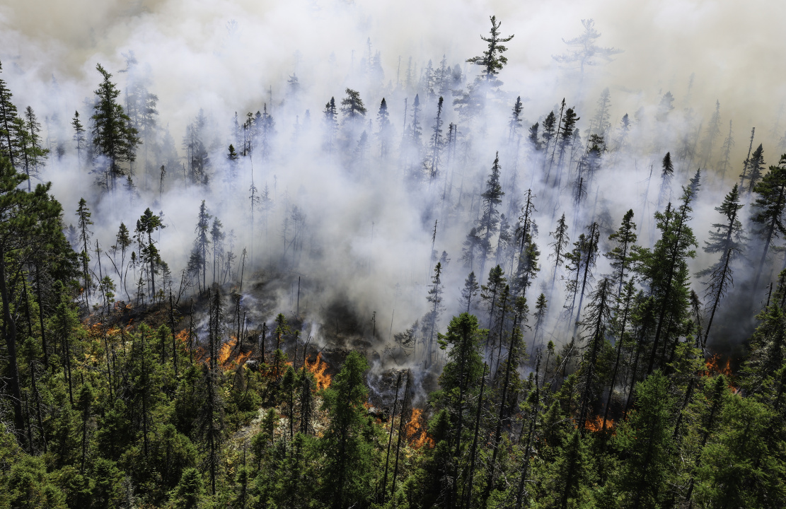Smoke from the Long Lake wildfires complex billows into the air.