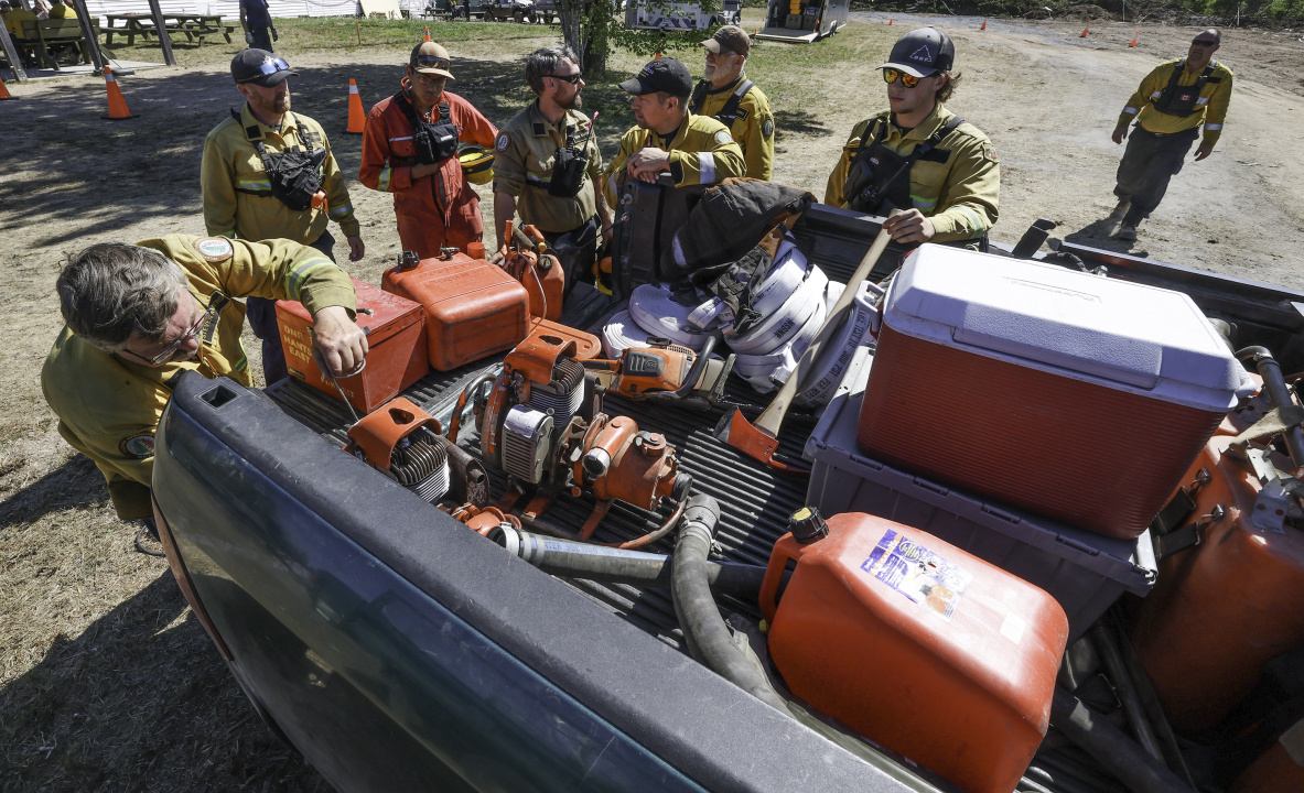 A Department of Natural Resources crew gets gear ready to fight the Long Lake wildfire complex.
