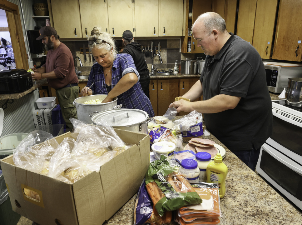Community volunteers prepare meals for fire crews and support personnel at the West Dalhousie Community Centre..