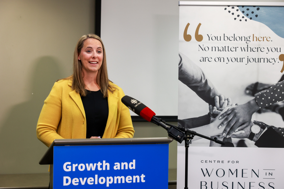 Stephanie Hovey, owner, Allied Therapy Ltd., at a podium