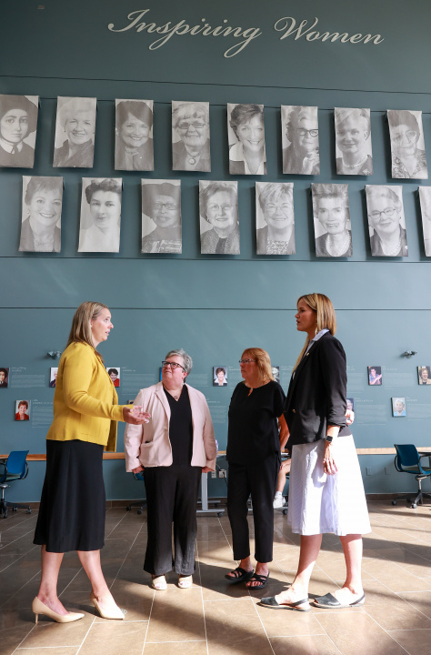 Minister Leah Martin chatting with people