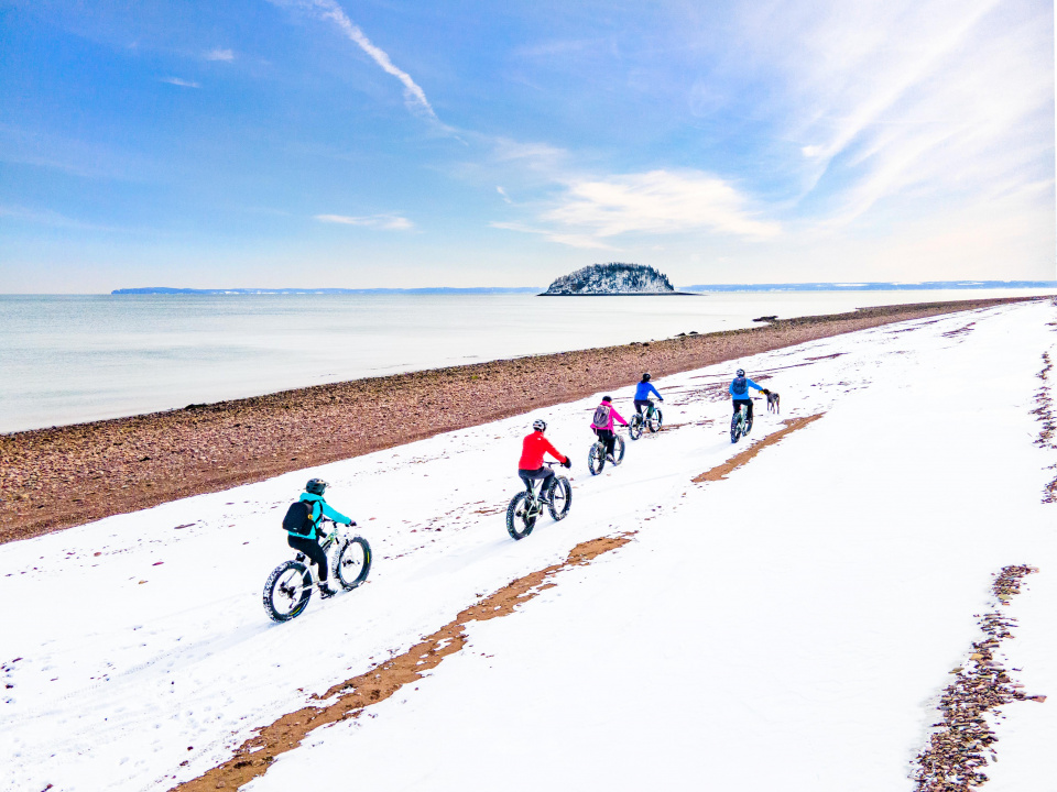 Guided winter cycling tour of Spencer’s Island in Cumberland County with Local Guy Adventures.
