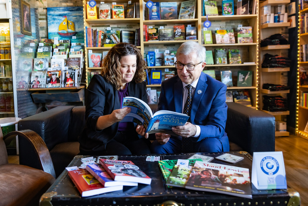 Ministerial Assistant Damian Stoilov with Nova Scotian author Heather Fegan.