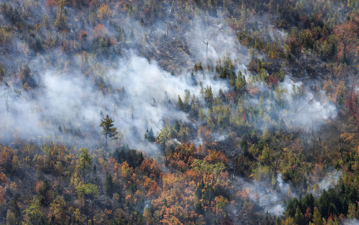 Aerial photo of smoke from the woods around Lake George