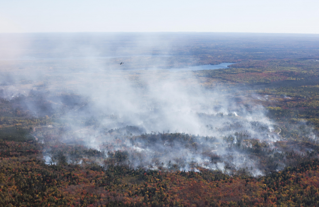 Aerial photo of smoke from the woods around Lake George