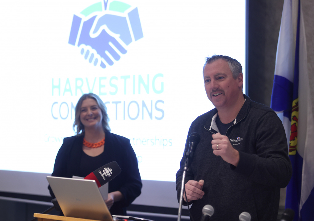 Agriculture Minister Greg Morrow at a podium