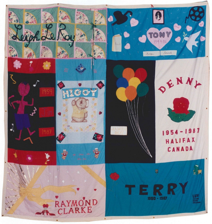 A section of the Canadian AIDS Memorial Quilt with people's names in the panels