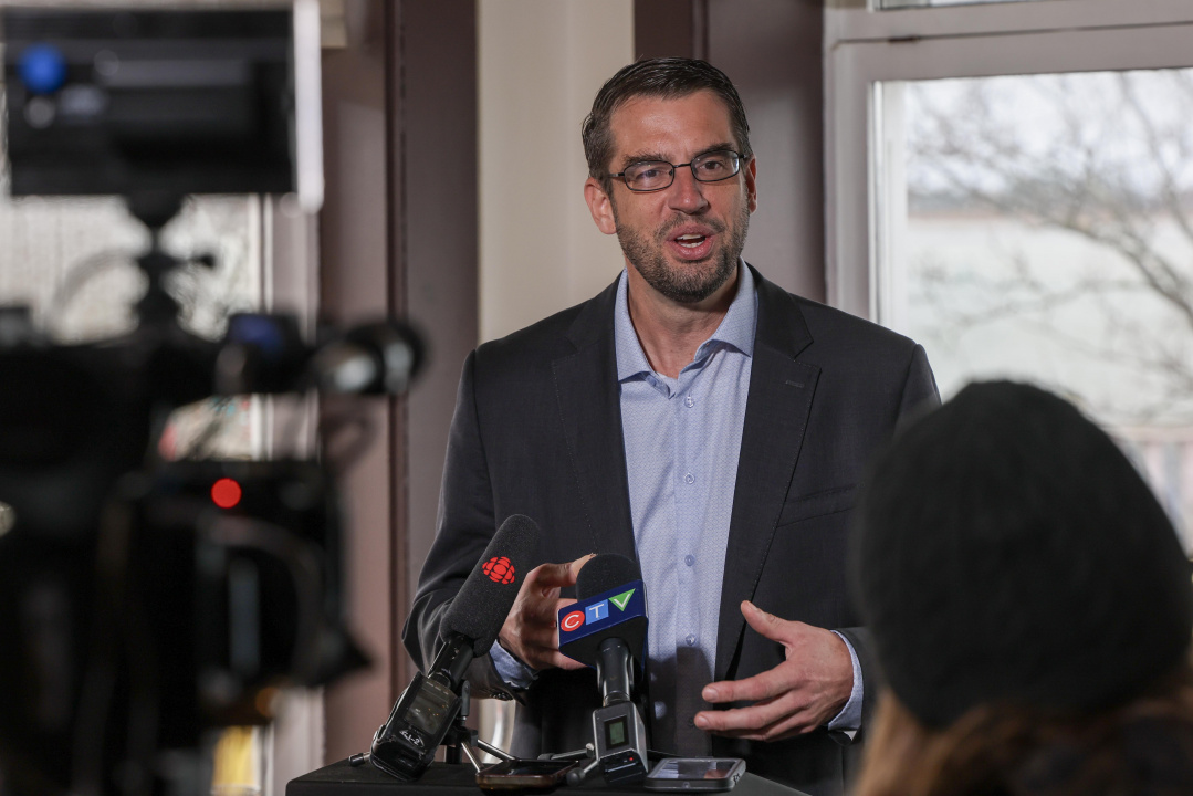 Kris Vascotto, Executive Director, Nova Scotia Seafood Alliance, at a podium