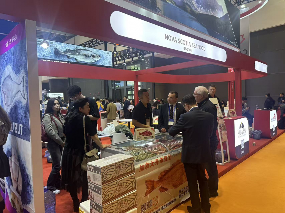 Fisheries and Aquaculture Minister Kent Smith at the Nova Scotia seafood booth during the China Fisheries and Seafood Expo. 
