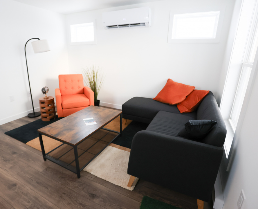 Chair, couch and coffee table in a modular home living room