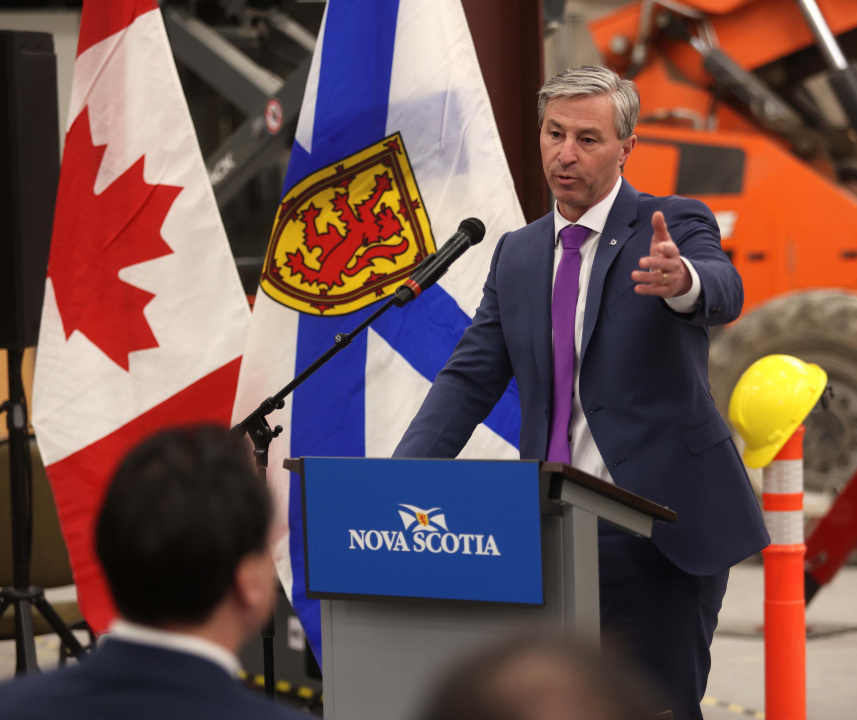 Premier Tim Houston at a podium