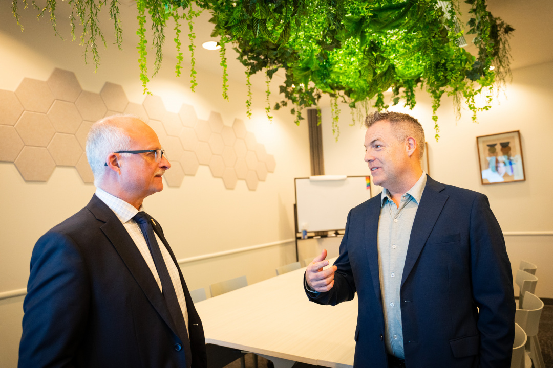 Minister John White, left, speaks with Doug Jones, CEO of Ignite Atlantic