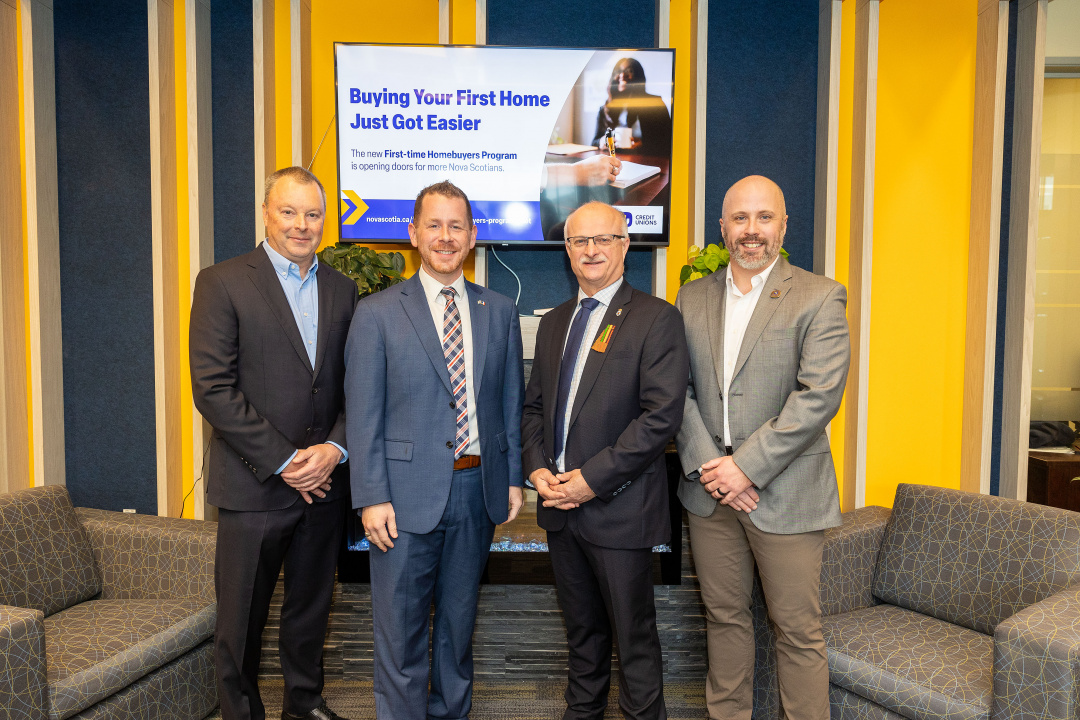 From left, Paul Masterson, President and CEO, Atlantic Central, Colton LeBlanc, Minister of Growth and Development, John White, Minister of Housing and Dan Roberts, Director, Retail Banking and Member Experience, East Coast Credit Union