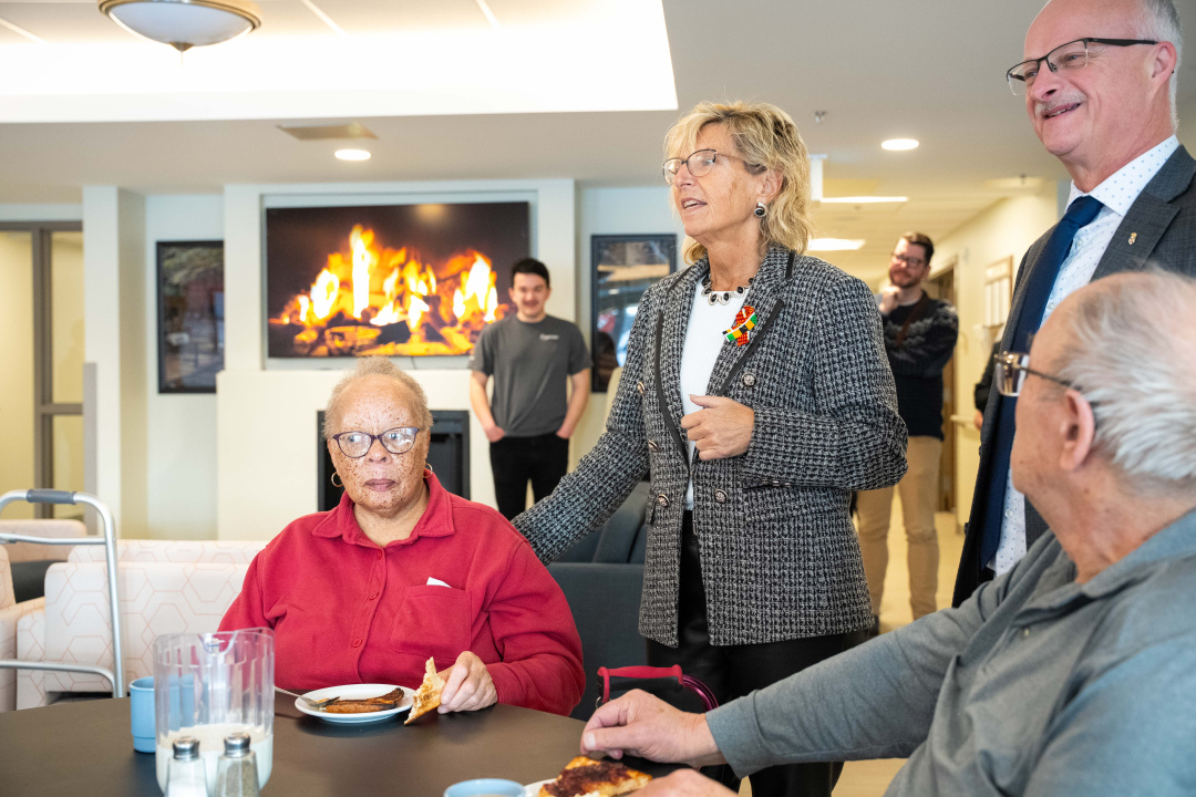 0424: Barbara Adams, Minister of Seniors and Long-Term Care, and John White, Minister of Housing and MLA for Glace Bay-Dominion, chat with residents including Tresia Elcock at Carefield Manor in Dominion. 