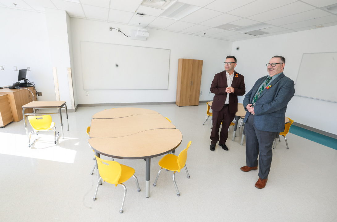 #5 – Brendan Maguire, left, Minister of Education and Early Childhood Development, and Public Works Minister Fred Tilley in a classroom at the new St. Josephs-Alexander McKay Elementary School. 