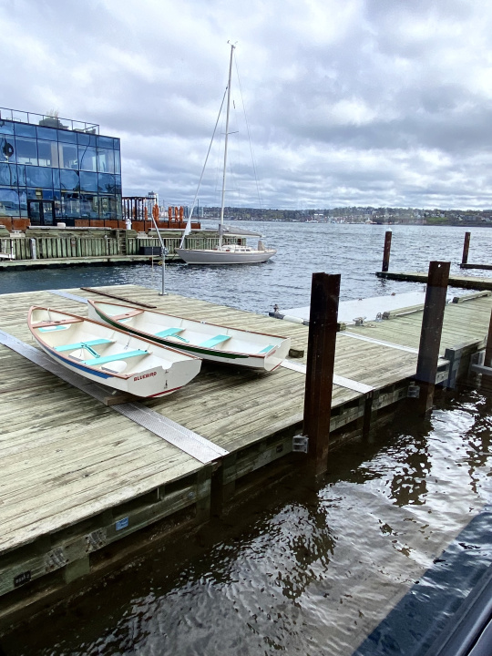 Bird class boats resting on the new Boat School marina.