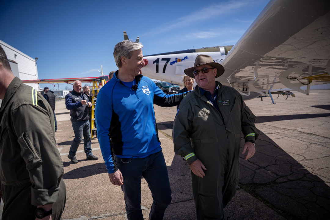 Premier Tim Houston and an event attendee.
