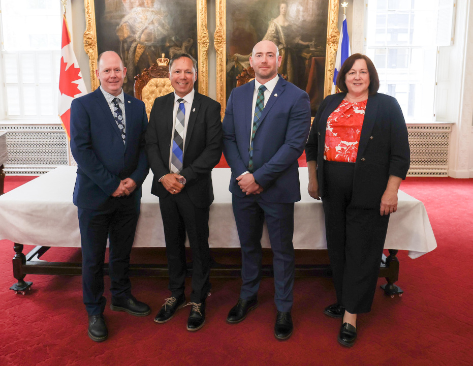 Tory Rushton, Brian Wong, Marco MacLeod and Susan Corkum-Greek in the Red Chamber at Province House
