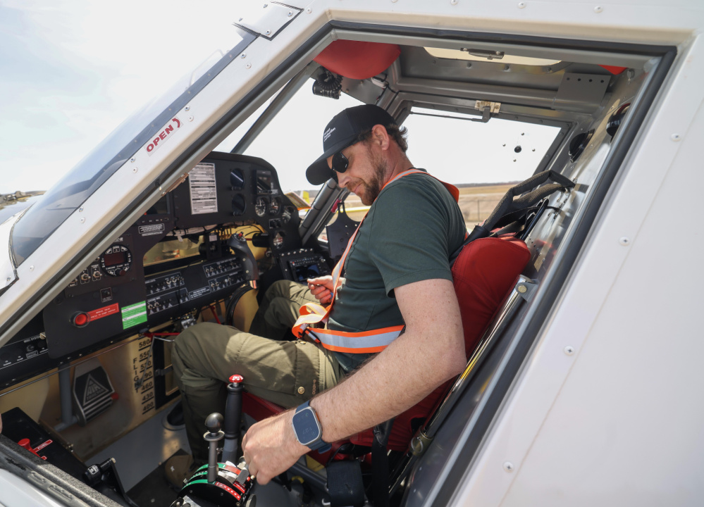 Phil Leblanc, AT-802 water bomber pilot, in the cockpit.