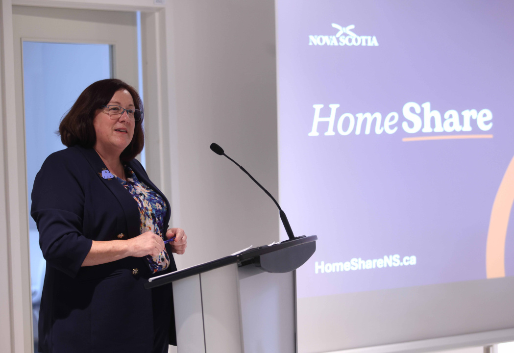 Susan Corkum-Greek, Minister of Opportunities and Social Development, speaks at the event.