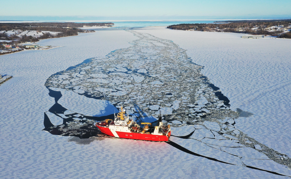 A Coast Guard vessel breaks up ice.
