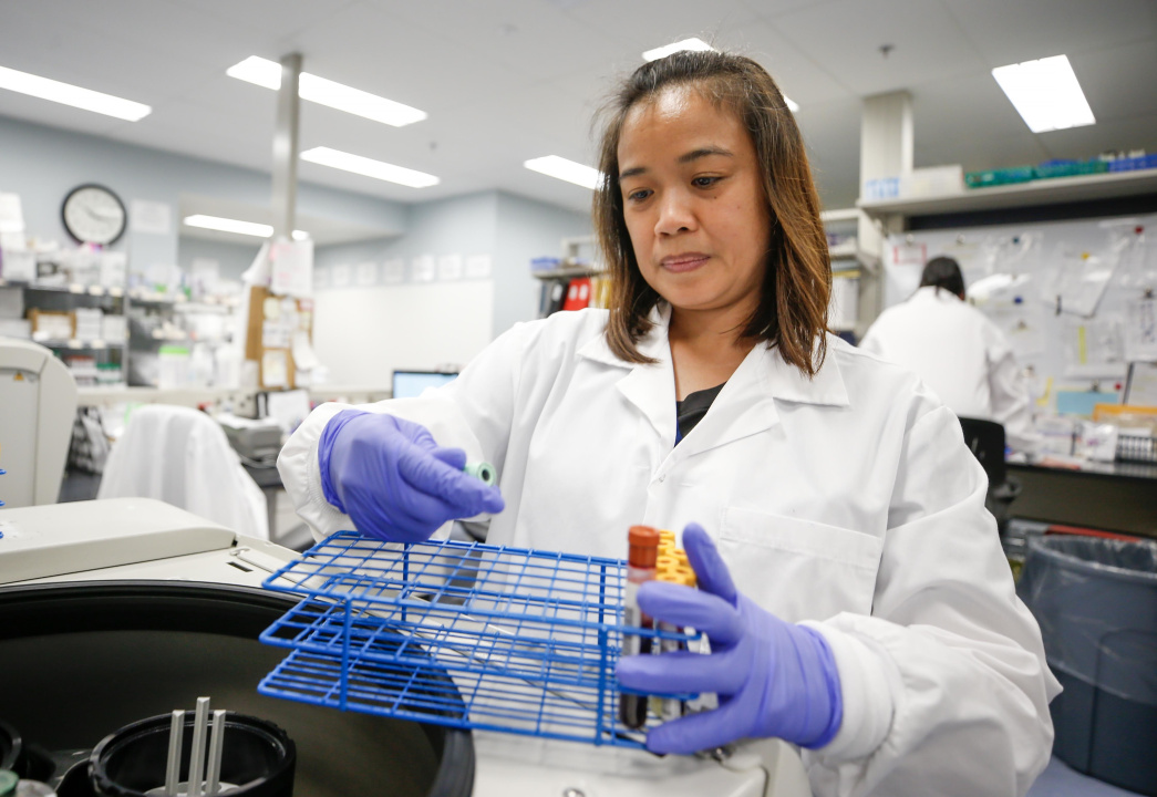 A lab tech with samples