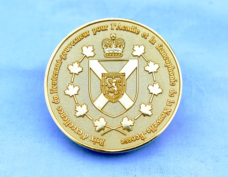 The Lieutenant-Governor's Award of Excellence for l’Acadie and Francophonie of Nova Scotia medal. 