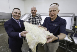 From left, Kent Smith, Minister of Fisheries and Aquaculture; Kerry Cunningham, sales/procurement with Sea Star Seafoods; and Neil LeBlanc, Chair of the Fisheries and Aquaculture Loan Board.