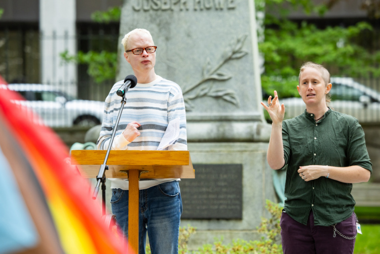Steve Roy, co-Chair of the Pride Nova Scotia Government Employee Network speaks at the flag raising