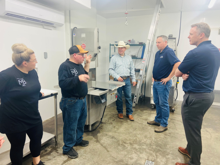  Laura McNabb, Chad Boudreau and Jared McNabb, co-owners of MB Meat Company; Agriculture Minister Greg Morrow; and Inverness MLA Kyle MacQuarrie