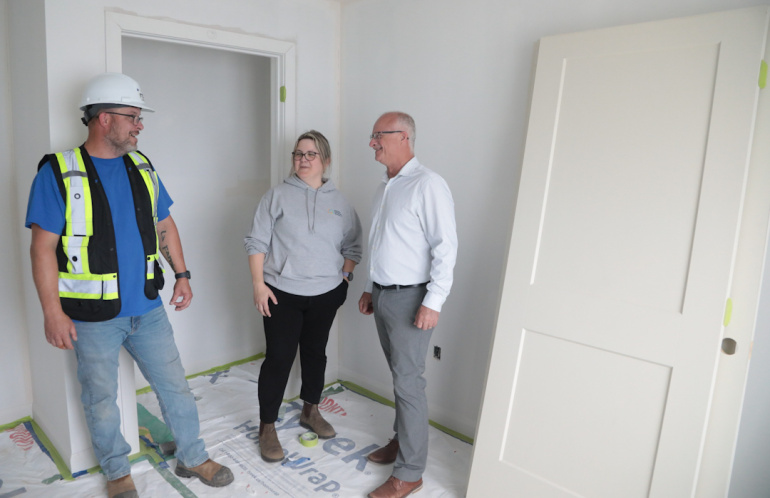 •	Shawn Murphy , Site Manager, RCS Construction,  shows a new apartment unit to Housing Minister John White and Jessica Ward,  Operations & Project Development Manager,  Housing Construction Council of Nova Scotia and Director at Vally Roots Housing Association.