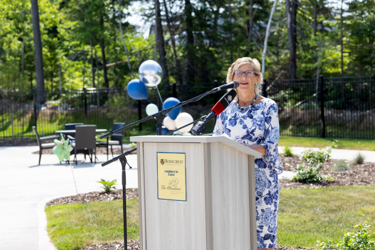 Barbara Adams, Minister of Seniors and Long-Term Care, at a podium outside