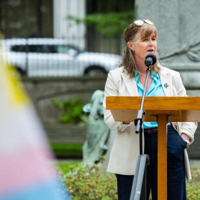 Tracey Barbrick, Deputy Minister champion for the Pride Nova Scotia Government Employee Network, speaks at the Pride flag raising 