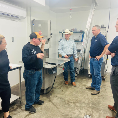  Laura McNabb, Chad Boudreau and Jared McNabb, co-owners of MB Meat Company; Agriculture Minister Greg Morrow; and Inverness MLA Kyle MacQuarrie
