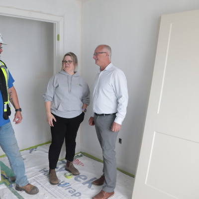 •	Shawn Murphy , Site Manager, RCS Construction,  shows a new apartment unit to Housing Minister John White and Jessica Ward,  Operations & Project Development Manager,  Housing Construction Council of Nova Scotia and Director at Vally Roots Housing Association.