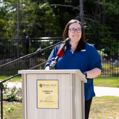 Laurie Parsons, Administrator of Rosecrest The Meadows, at a podium outside